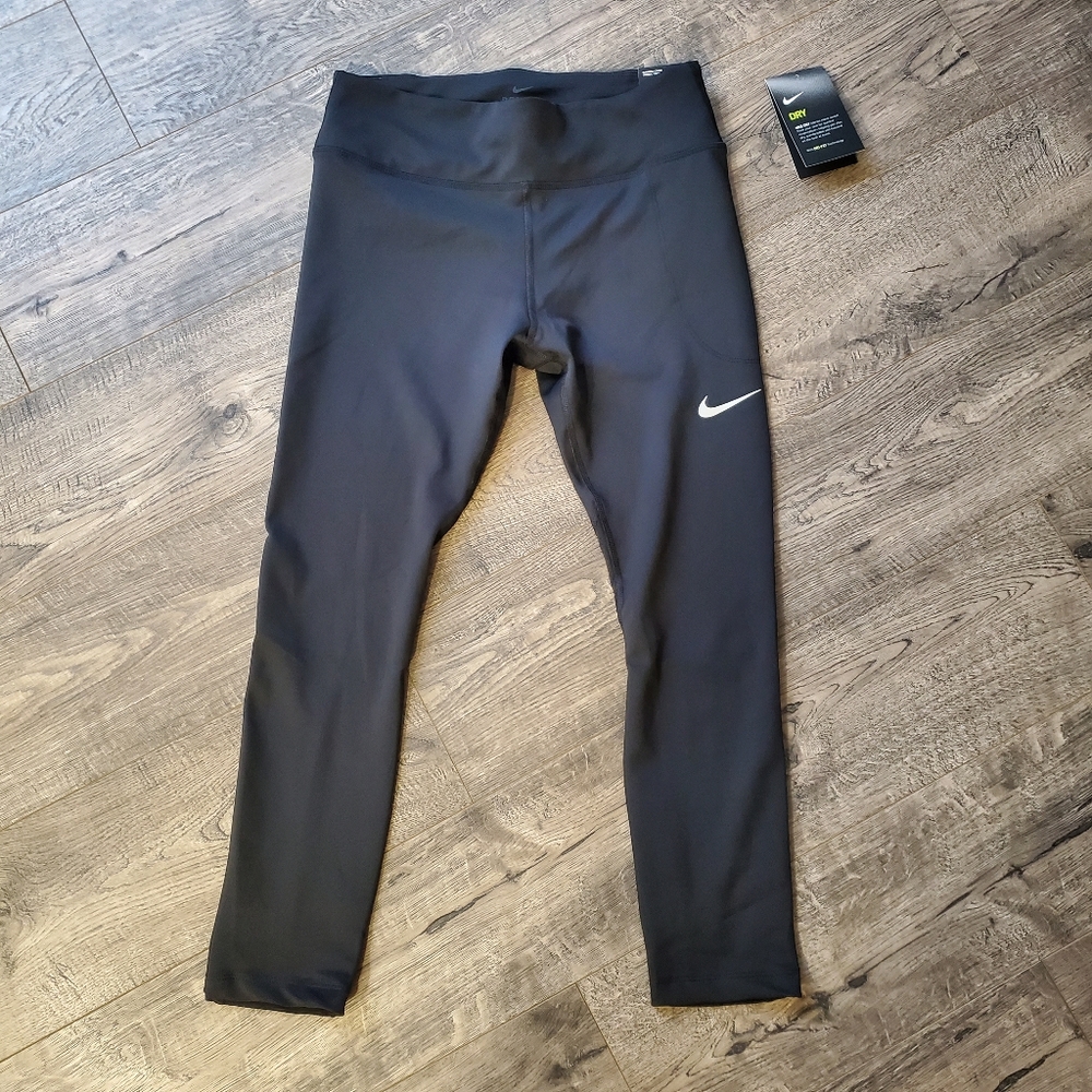 NWT! Super Cute Nike Swoosh Logo Leggings Size: M